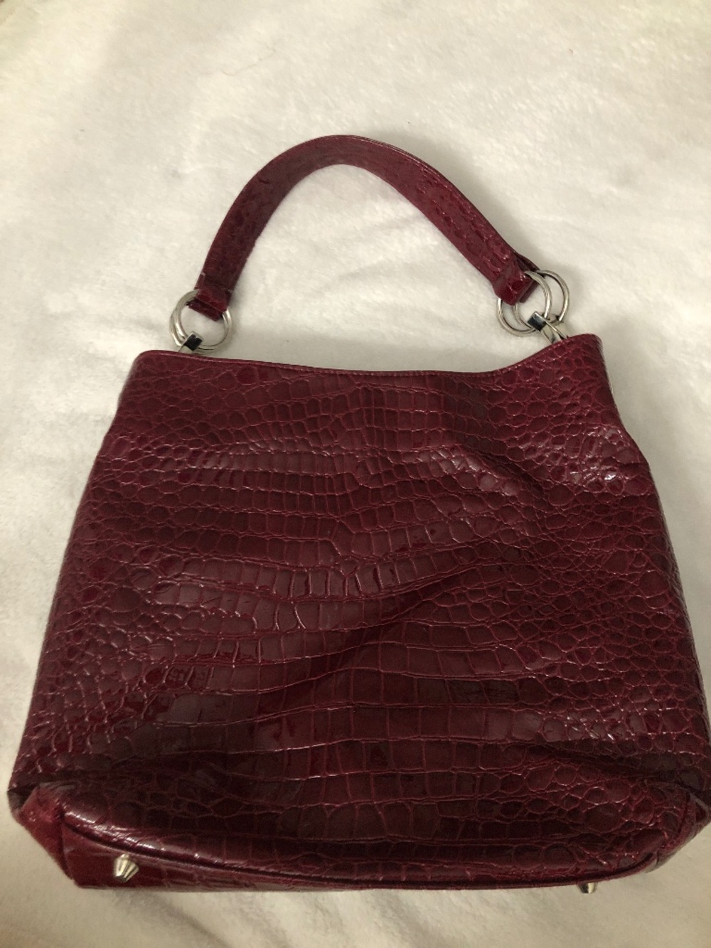 Dark red purse.